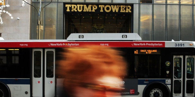 NEW YORK, NY - DECEMBER 08: People walk by the Trump Tower in Midtown Manhattan on December 8, 2015 in New York City. Donald