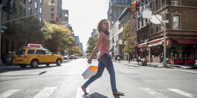 Woman shopping in NYC and walking on the street