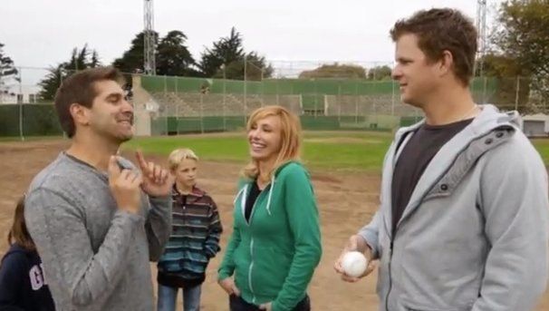 Former San Francisco Giants pitcher Matt Cain, right, hugs mascot