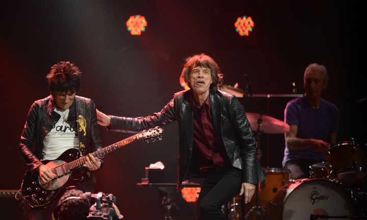 Ronnie Wood (L), Mick Jagger (C) and Charlie Watts of The Rolling Stones perform during '12-12-12 The Concert For Sandy Relief' December 12, 2012 at Madison Square Garden in New York. AFP PHOTO/DON EMMERT (Photo credit should read DON EMMERT/AFP/Getty Images)