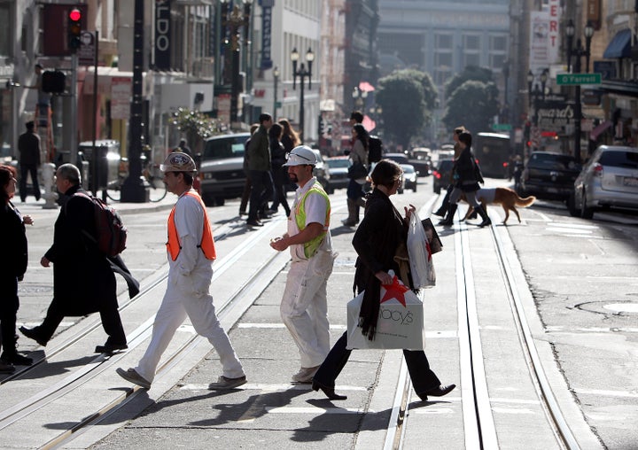 SAN FRANCISCO, CA - JANUARY 14: A pedestrian carries a shopping bag while walking through Union Square on January 14, 2011 in San Francisco, California. Retail sales were up 0.6 percent in December, the sixth consecutive month of increases. Retail sales for 2010 were up 6.7 percent, the largest annual increase since 1999. (Photo by Justin Sullivan/Getty Images)