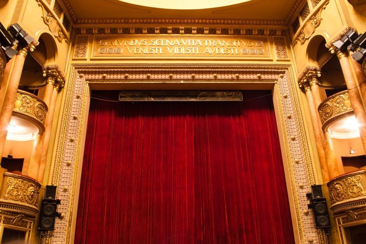 theater stage with red curtain