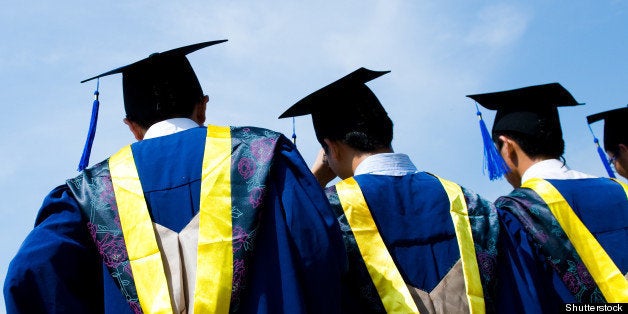 back of chinese graduates with...