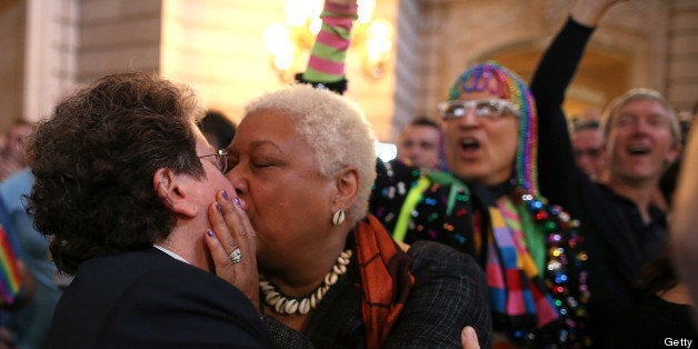 SAN FRANCISCO, CA - JUNE 26: Same-sex couple Jewelle Gomez (R) and Diane Sabin react upon hearing the U.S. Supreme Court's rulings on gay marriage in City Hall June 26, 2013 in San Francisco, California. The high court struck down the Defense of Marriage Act (DOMA) and ruled that supporters of California's ban on gay marriage, Proposition 8, could not defend it before the Supreme Court. (Photo by Justin Sullivan/Getty Images)