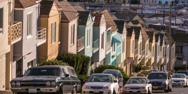 SAN FRANCISCO, CA - SEPTEMBER 20: Cars are parked along a row of houses on Potrero Hill on September 20, 2013, in San Francisco, California. More than 13.6 million international travelers visit California each year generating nearly $100 billion in revenue and creating approximately 900,000 jobs in the arts, entertainment, recreation, food service and accomodations sectors. (Photo by George Rose/Getty Images)