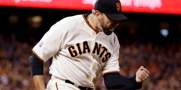 San Francisco Giants' Jeremy Affeldt reacts after getting St. Louis Cardinals' Oscar Taveras to ground out and end the top of the ninth inning of Game 5 of the National League baseball championship series Thursday, Oct. 16, 2014, in San Francisco. (AP Photo/David J. Phillip)