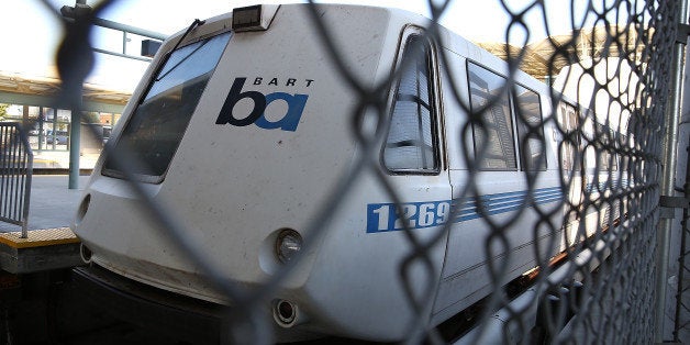 MILLBRAE, CA - JULY 03: A Bay Area Rapid Transit (BART) train sits idle at the Millbrae station on July 3, 2013 in Millbrae, California. For a third day, hundreds of thousands of San Francisco Bay Area commuters are scrambling to find ways to work as two of San Francisco Bay Area Rapid Transit's (BART) largest unions remain on strike while they continue contract negotiations with management. Train operators, mechanics, station agents and maintenance workers are seeking a five percent wage increase and are fighting management who want to have workers to begin contributing to their pensions, pay more for health insurance and reduce overtime expenses. (Photo by Justin Sullivan/Getty Images)