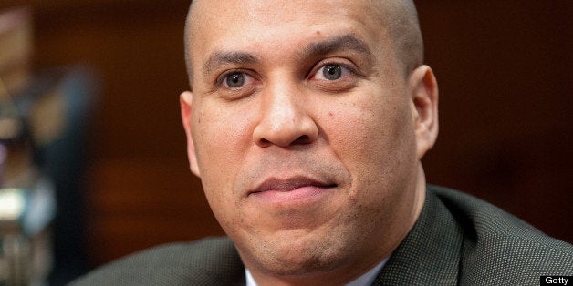 NEWARK, NJ - JANUARY 15: Mayor Cory Booker visits 'Extra' at Newark City Hall on January 15, 2013 in Newark, New Jersey. (Photo by D Dipasupil/Getty Images for Extra)