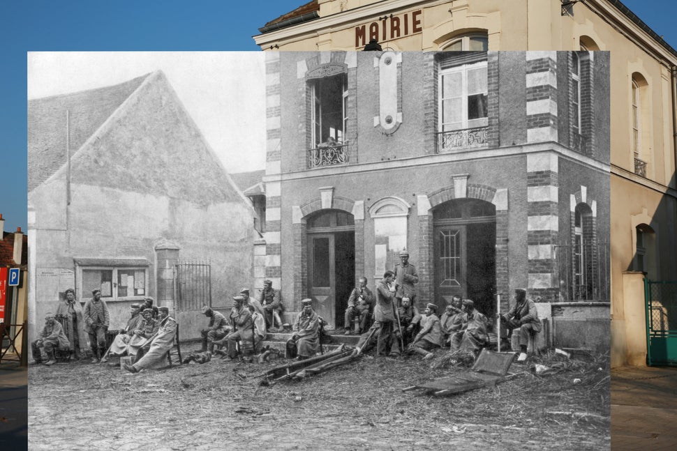 In the first picture, a man stands near the town hall of Vareddes, France, on March 12, 2014. In the second photo, German tro
