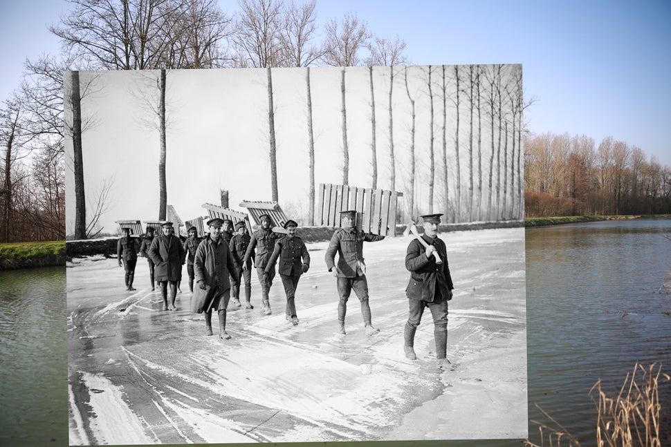 In the colored photo, trees surround the Somme canal on March 12, 2014 in Frise, France. In the black and white photo, Britis