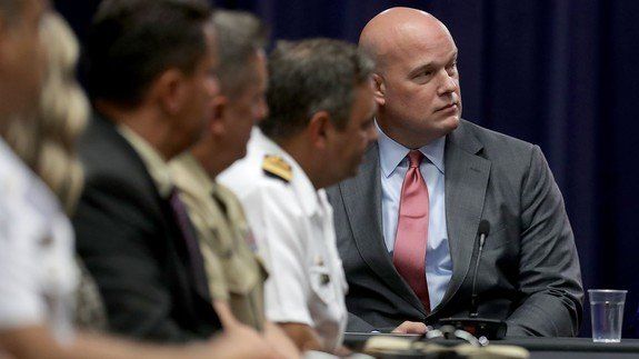 Matt Whitaker, now the acting attorney general, participates in an August roundtable event at the Department of Justice.