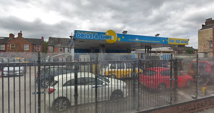 Three men were arrested in the modern slavery raid at the Drive and Shine Carwash on Stockport Road in Levenshulme, Manchester.