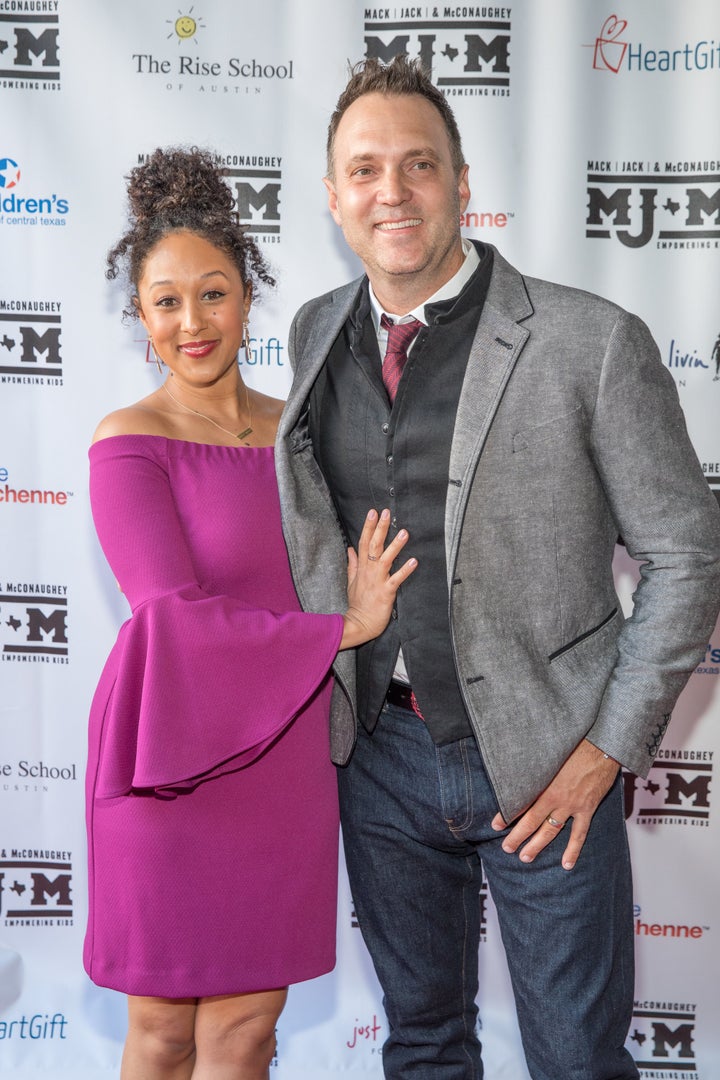 Tamera Mowry-Housley and husband Adam Housley pictured together. 