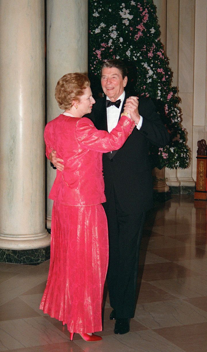 WASHINGTON, DC - NOVEMBER 16: British Prime Minister Margaret Thatcher dances with US President Ronald Reagan 16 November 1988 following a state dinner given in her honor at the White House. (Photo credit should read M. SPRAGUE/AFP/Getty Images)