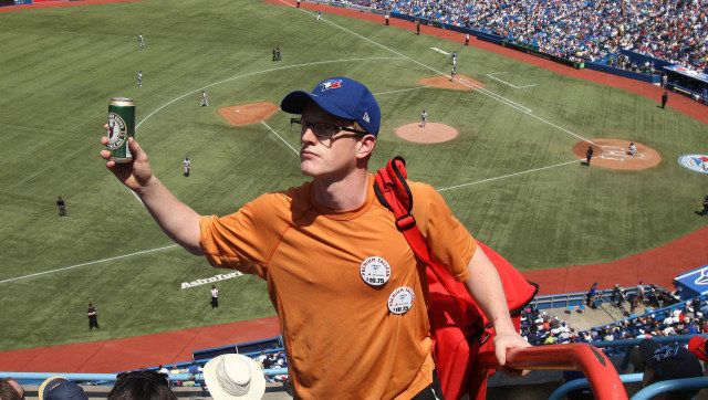 TORONTO, CANADA - MAY 20: A vendor sells beer during MLB game action between the New York Mets and the Toronto Blue Jays on May 20, 2012 at Rogers Centre in Toronto, Ontario, Canada. (Photo by Tom Szczerbowski/Getty Images)