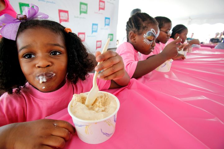 WASHINGTON DC-AUGUST 20, 2011: 3 yr old Camilla Rivera (202-544-08590 whose name did not get called for the ice cream eating contest, plopped herself right down anyways, at the DC Scoop, the first annual ice cream tasting event held at Union Market at Cap City in Washington DC. (Photo by Rebecca D'Angelo/For the Washington Post)
