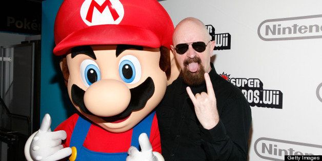 NEW YORK - NOVEMBER 12: Mario (L) and Judas Priest's Rob Halford (R) attends the 25 years of Mario celebration at the Nintendo World Store on November 12, 2009 in New York City. (Photo by Amy Sussman/Getty Images)