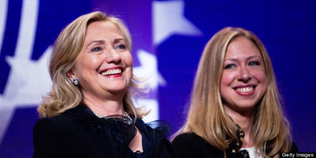 NEW YORK CITY- SEPTEMBER 22: Hillary Rodham Clinton (L), Secretary of State stands with her daughter Chelsea Clinton during the closing Plenary session of the seventh Annual Meeting of the Clinton Global Initiative (CGI) at the Sheraton New York Hotel on September 22, 2011 in New York City. Established in 2005 by former U.S. President Bill Clinton, the CGI assembles global leaders to develop and implement solutions to some of the world's most urgent problems. (Photo by Daniel Berehulak/Getty Images)