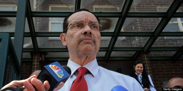 WASHINGTON, DC - APRIL 5: Mayor Vincent Gray talks to reporters after he visits Tyler House, site of last months' drive by sh