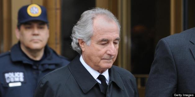 Disgraced Wall Street financier Bernard Madoff leaves US Federal Court after a hearing on March 10, 2009 in New York. Madoff has agreed to plead guilty to 11 counts of fraud, his lawyer said in court. AFP PHOTO/Stan HONDA (Photo credit should read STAN HONDA/AFP/Getty Images)