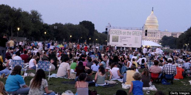 UNITED STATES - JULY 25: An audience gathers on the mall Screen on the Green, a summer movie series on Monday nights at sunset on the National Mall. (Photo By Philip Scott Andrews/Roll Call/Getty Images)
