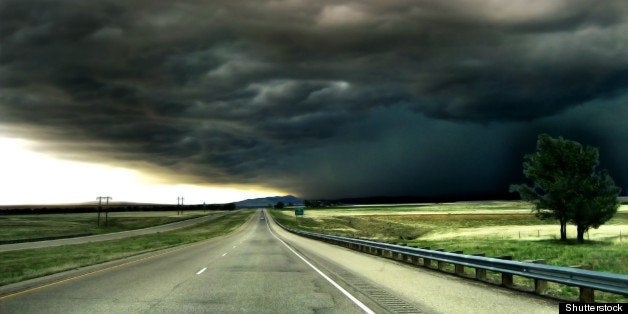 highway leading into a storm on ...