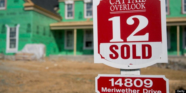A 'Sold' sign stands in front of a home under construction at the Toll Brothers Inc. Cattail Overlook development in Glenelg,
