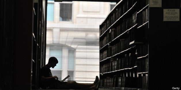 WASHINGTON, DC - SEPTEMBER 25: Case Stiglbauer, 22, a University of South Carolina student doing research in DC, spends time at the MLK Library, the city's main brach, on September 25, 2011, in Washington, DC. Stiglbauer has used this branch on Sundays when the Library of Congress is closed. The DC government is eliminating Sunday hours at this branch. (Photo by Jahi Chikwendiu/The Washington Post via Getty Images)