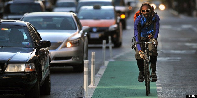 WASHINGTON, DC- NOVEMBER 08: A bicyclist uses a bike lane along L St. NW that is not officially open yet on Thursday November 08, 2012 in Washington, DC. (Photo by Matt McClain for The Washington Post via Getty Images)