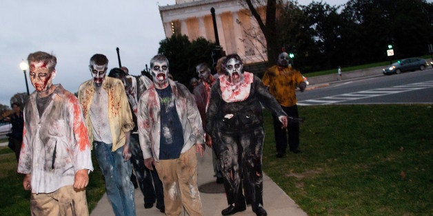 WASHINGTON - OCTOBER 26: Zombies walk the streets during the Worldwide Zombie Invasion at Lincoln Memorial on October 26, 201
