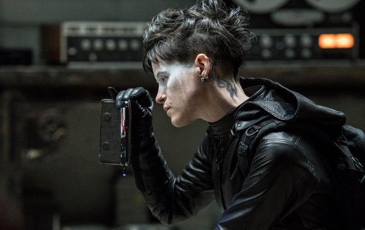 In "The Girl In The Spider's Web," Lisbeth is a club kid Batman, a stylish angel of death, complete with getaway ca