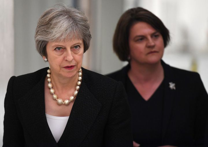 Prime Minister Theresa May (left) and Arlene Foster, the leader of the Democratic Unionist Party (DUP).