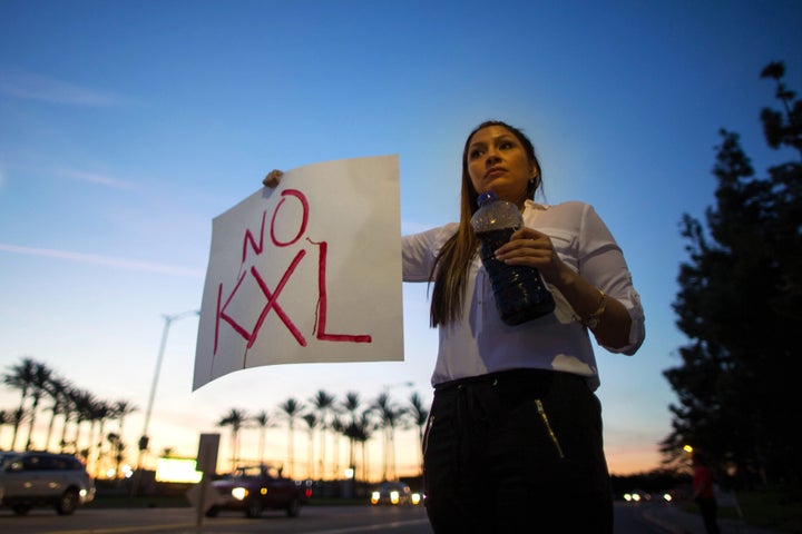 Terra Moore KillsMany, 34, holds a bottle symbolizing contaminated drinking water during a protest against the Keystone XL Pipeline three years ago in Arcadia, California.