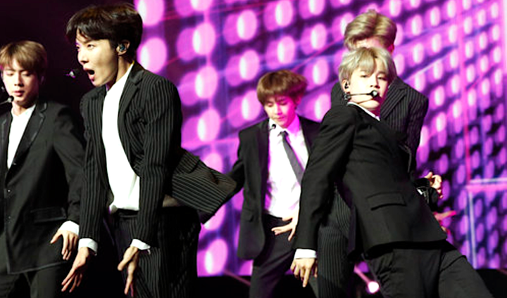 BTS has sold out U.S. arenas and topped the Billboard charts twice. 