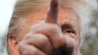 U.S. President Donald Trump speaks to reporters as he departs the White House en route to Paris from Washington, U.S. November 9, 2018. REUTERS/Kevin Lamarque