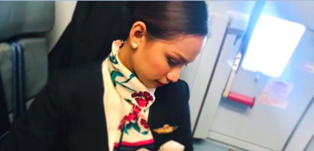 Flight Attendant Breastfeeds Passenger's Crying Baby | HuffPost Life