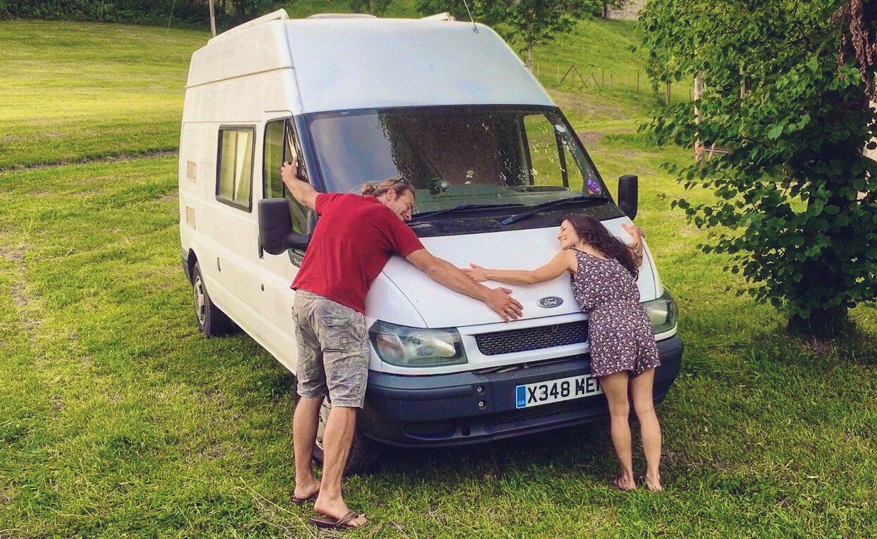 Drew and Brittany hugging The Howeller, their European honeymoon mobile, in Germany in June 2017.