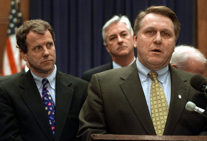 Brown looks on as Teamsters Union President James P. Hoffa voices his opposition to Mexican trucks entering the U.S. under th