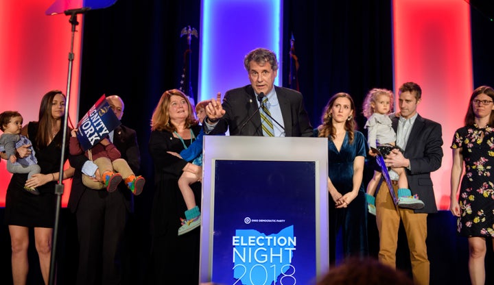 Brown, surrounded by members of his family, speaks in Columbus after his campaign victory. 