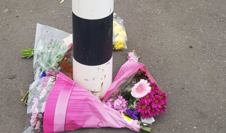 Flowers at the scene of the crash last month 