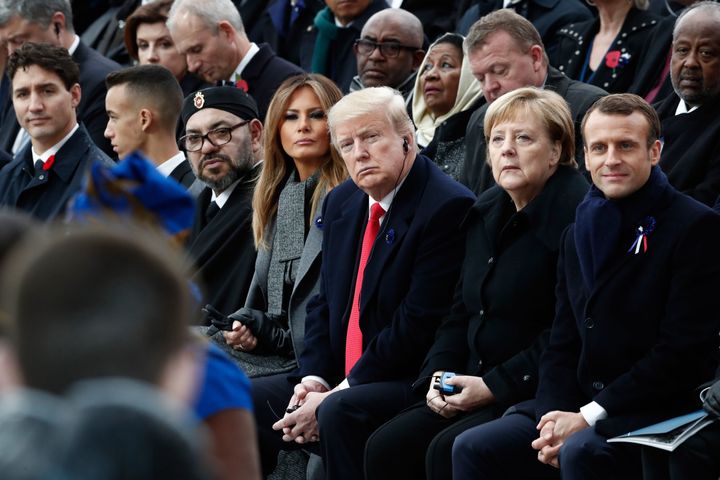 Canadian Prime Minister Justin Trudeau (L), Moroccan King Mohammed VI (3rd L) and his son Crown Prince Hassan Moulay (2nd L), U.S. First Lady Melania Trump (C), U.S. President Donald Trump (3rd R), German Chancellor Angela Merkel (2nd R) and French President Emmanuel Macron attend a ceremony at the Arc de Triomphe in Paris on November 11, 2018 as part of commemorations marking the 100th anniversary of the 11 November 1918 armistice, ending World War I. (BENOIT TESSIER/AFP/Getty Images)