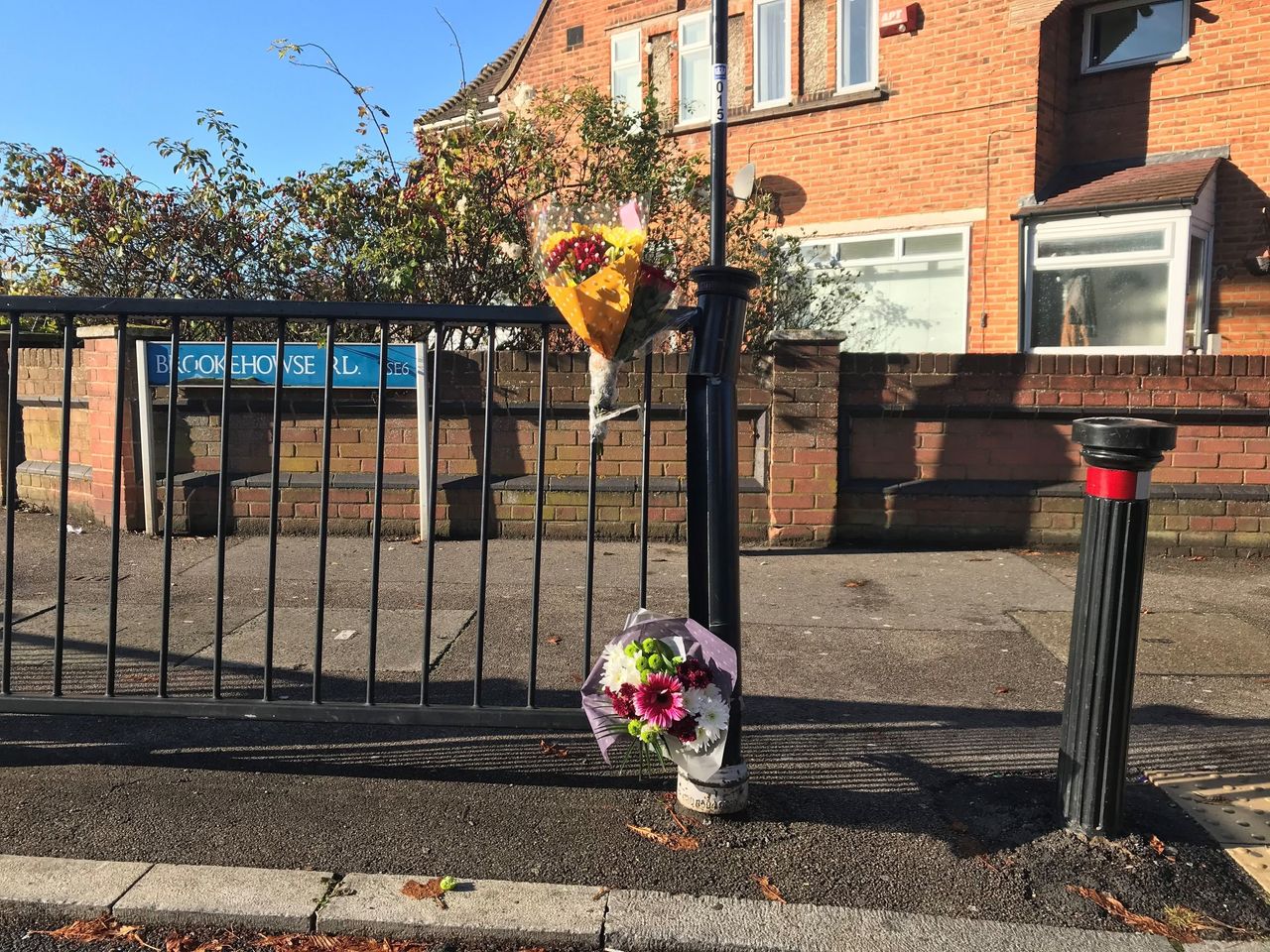 Flowers left at scene in Randlesdown Road in Bellingham, south-east London, where a 15-year-old boy was fatally stabbed.