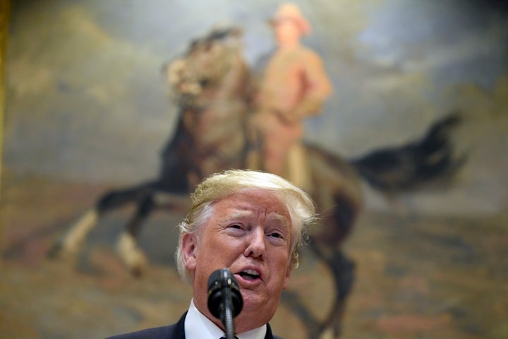 President Donald Trump signed a proclamation on Friday that, coupled with an interim rule issued by his administration on Thursday, temporarily barred certain immigrants from asylum.