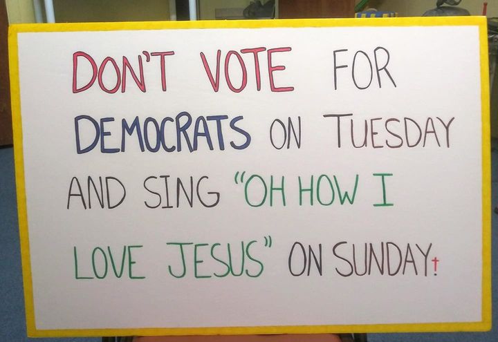 Al Carlisle, the senior pastor of Grace of God Church in New Port Richey, Florida, posted a photo of this sign on his Facebook page on Election Day, with a caption reading, "My sign at our church's polling site."