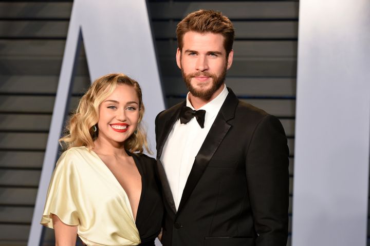 Miley Cyrus and Liam Hemsworth attend the 2018 Vanity Fair Oscar party on March 4 in Beverly Hills, CA. 