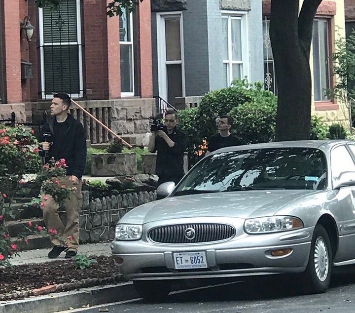 Conspiracy theorist Jack Posobiec being followed by the Clark brothers as they videotape him.