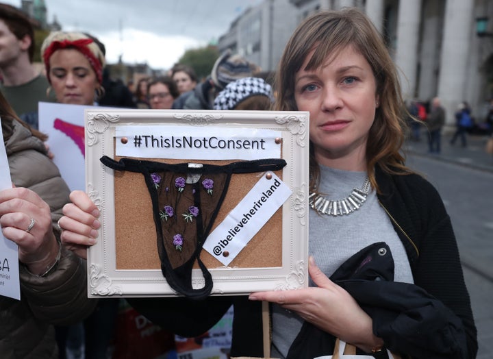 People gather in Dublin for a protest in support of victims of sexual violence.