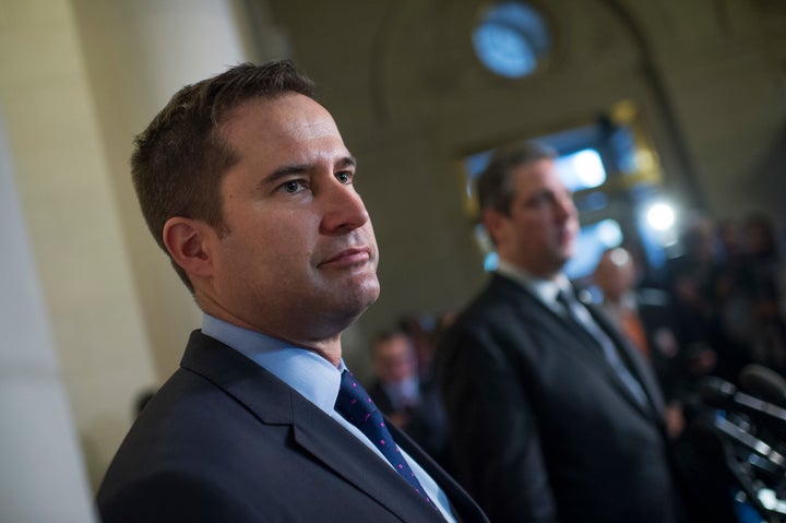 Rep. Seth Moulton (D-Mass.), left, appears with Rep. Tim Ryan (D-Ohio) after Ryan lost the race for Democratic leader to Pelo