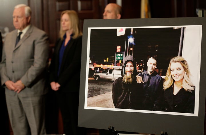 A picture of Katelyn McClure, right, Mark D'Amico, center, and Johnny Bobbitt Jr., left, displayed during a news conference in Mt. Holly, New Jersey, on Nov. 15, 2018.