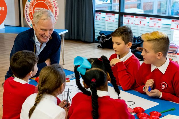 Prof Philip Alston talking to children in Scotland